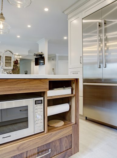 classic kitchen, white cabinets, walnut cabinets, glass pendants, caesarstone counters, island (1) (1)